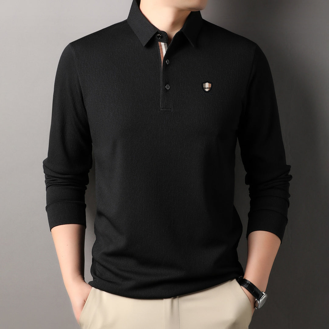 Herrar elegant långärmad polo med strukturerat material och sportig design Mirla-Eva Jonsson