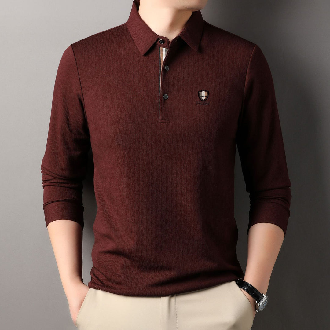 Herrar elegant långärmad polo med strukturerat material och sportig design Mirla-Eva Jonsson