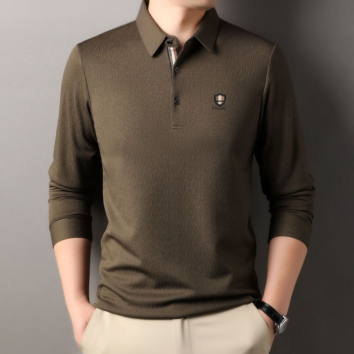 Herrar elegant långärmad polo med strukturerat material och sportig design Mirla-Eva Jonsson