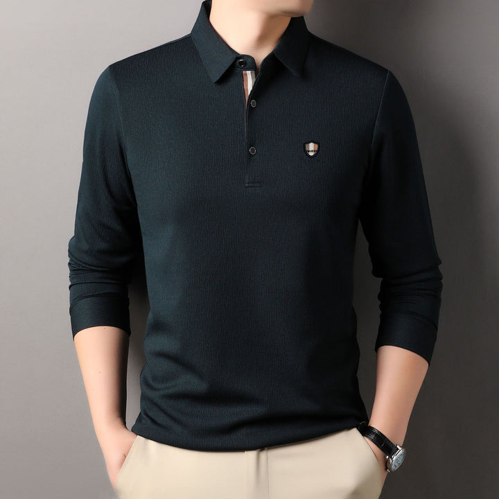 Herrar elegant långärmad polo med strukturerat material och sportig design Mirla-Eva Jonsson
