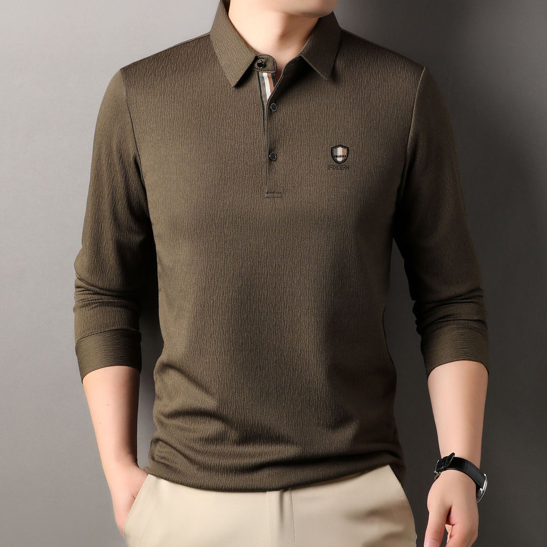 Herrar elegant långärmad polo med strukturerat material och sportig design Mirla-Eva Jonsson