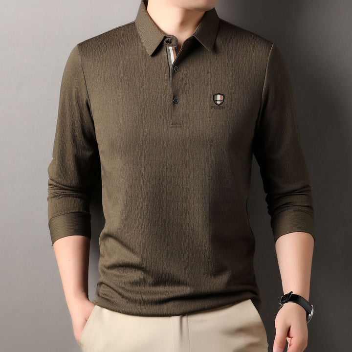 Herrar elegant långärmad polo med strukturerat material och sportig design Mirla-Eva Jonsson