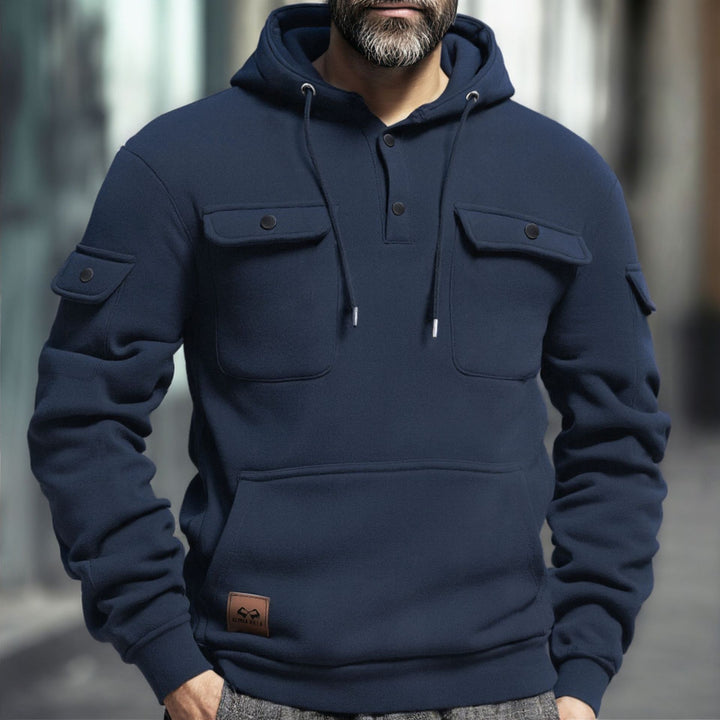 Herrar fleece-hoodie med praktiska bröstfickor Mirla-Eva Jonsson
