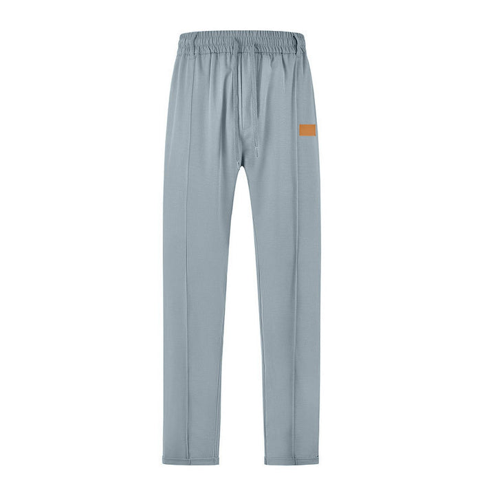Herrar fritids-joggingbyxor med justerbar midja och praktiska sidofickor Mirla-Eva Jonsson