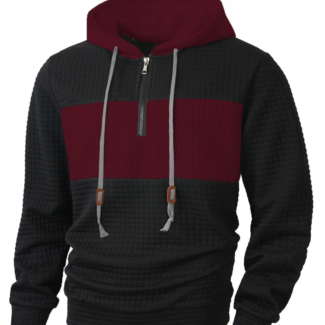 Herrar hoodie med 1/4-dragkedja och strukturerad design Mirla-Eva Jonsson