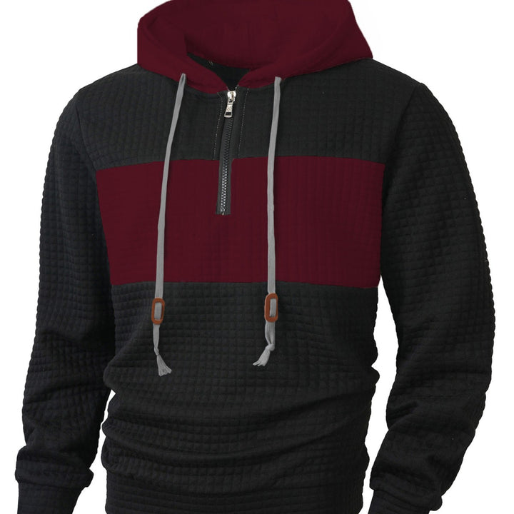 Herrar hoodie med 1/4-dragkedja och strukturerad design Mirla-Eva Jonsson