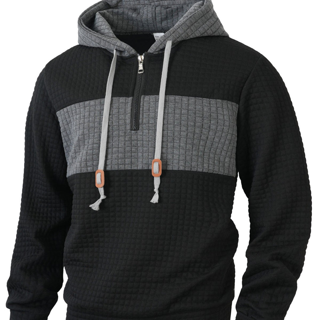 Herrar hoodie med 1/4-dragkedja och strukturerad design Mirla-Eva Jonsson