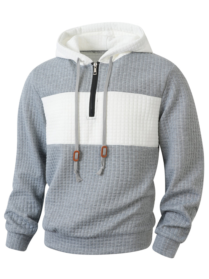 Herrar hoodie med 1/4-dragkedja och strukturerad design Mirla-Eva Jonsson