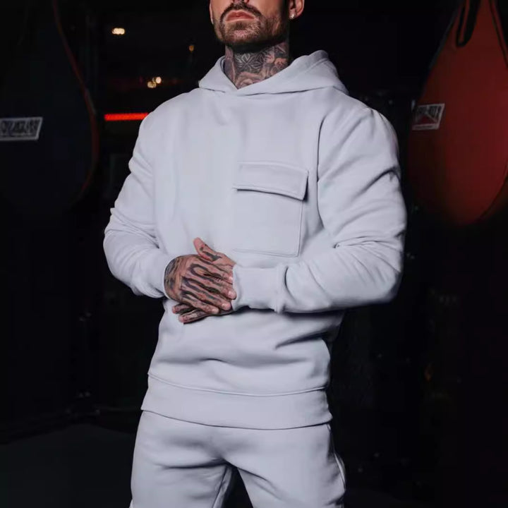 Herrar hoodie med praktisk bröstfickdesign Mirla-Eva Jonsson