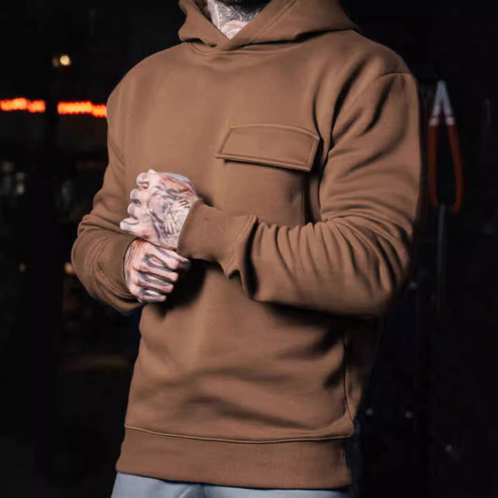 Herrar hoodie med praktisk bröstfickdesign Mirla-Eva Jonsson
