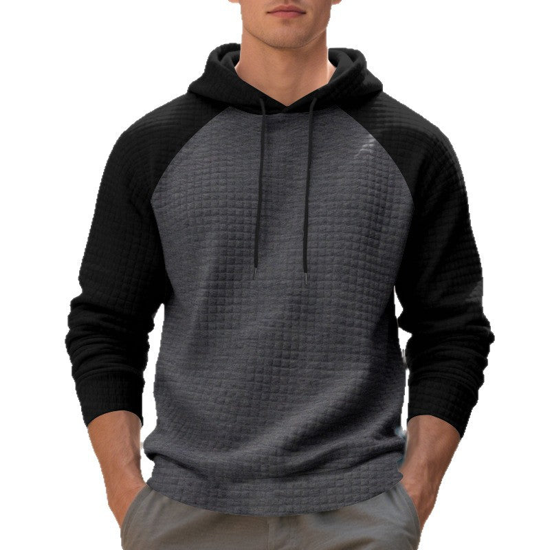 Herrar hoodie med strukturerad tyg och kontrasterande ärmar Mirla-Eva Jonsson