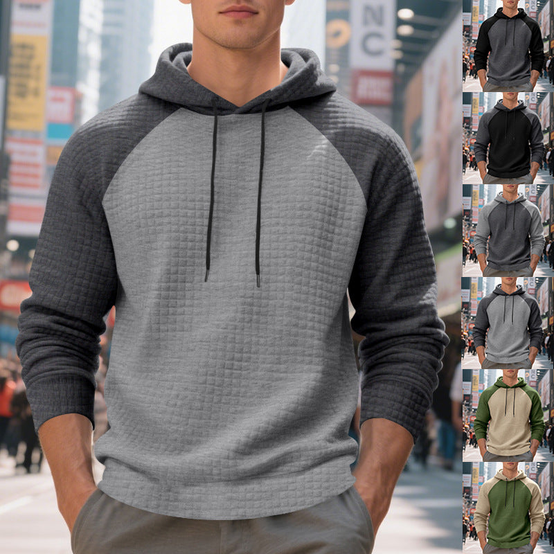Herrar hoodie med strukturerad tyg och kontrasterande ärmar Mirla-Eva Jonsson
