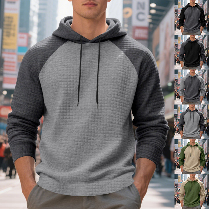 Herrar hoodie med strukturerad tyg och kontrasterande ärmar Mirla-Eva Jonsson