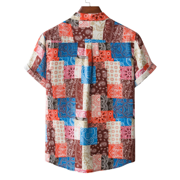 Herrar kortärmad skjorta i färgglad patchworkdesign med Henley-öppning Mirla-Eva Jonsson