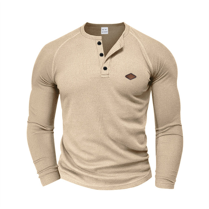 Herrar långärmad Henley-T-shirt med strukturerad väv och modernt knappdesign Mirla-Eva Jonsson