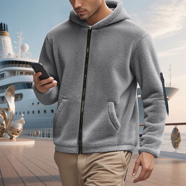 Herrar mjuk fleece hoodie med glansig dragkedja och praktiska fickor Mirla-Eva Jonsson