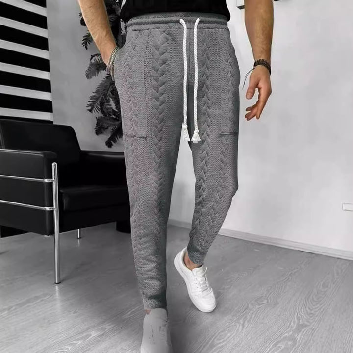 Herrar modiska joggingbyxor med unik strukturdesign Mirla-Eva Jonsson