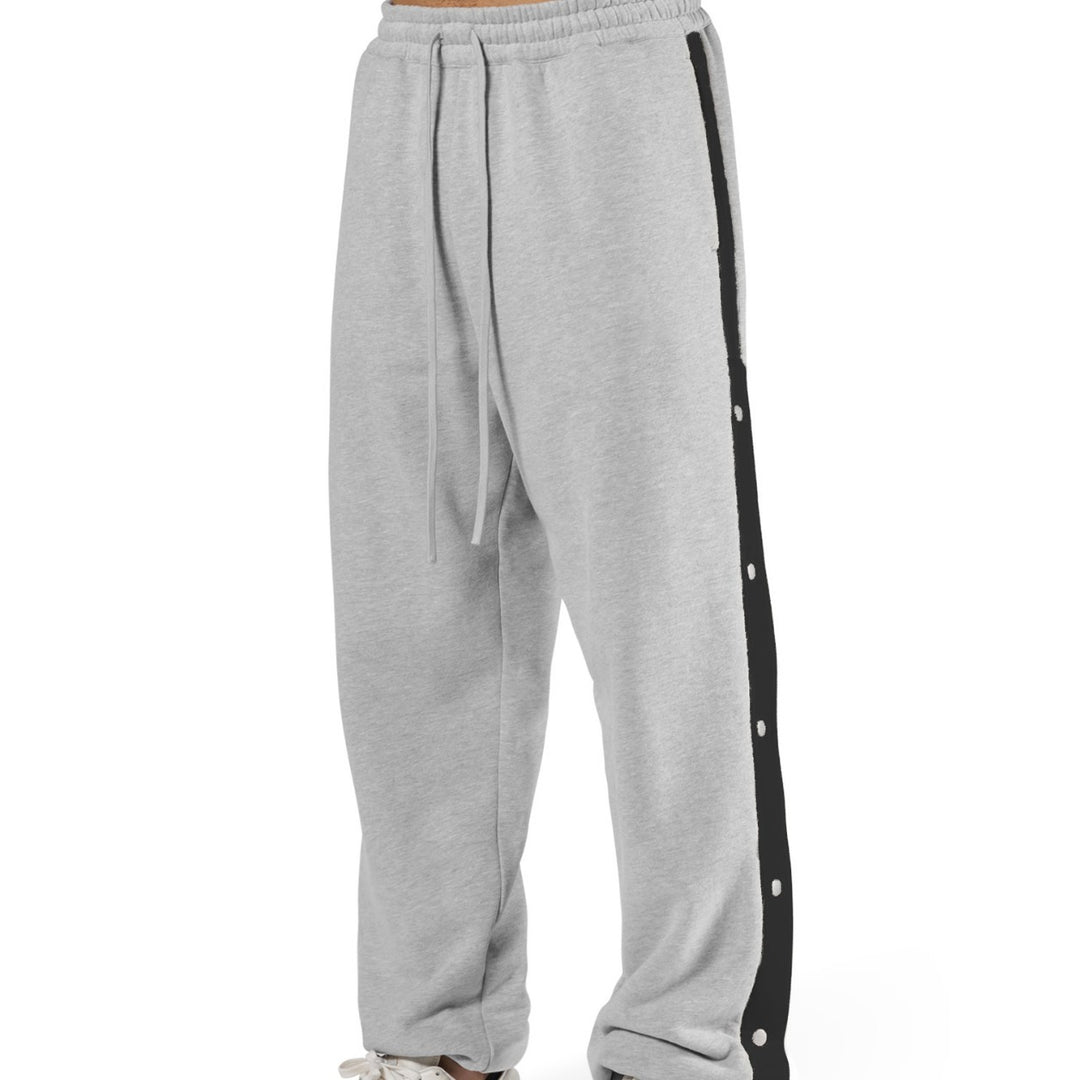 Herrar sportbyxor med tryckknappar och elastisk midja Mirla-Eva Jonsson