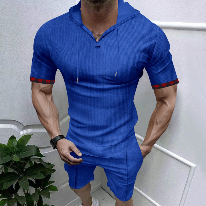 Herrar sportig kortärmad skjorta och shorts set med huva och kontrasterande ärmslut Mirla-Eva Jonsson