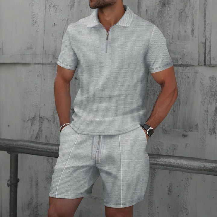 Herrar sportig polo-outfit med modern dragkedja Mirla-Eva Jonsson