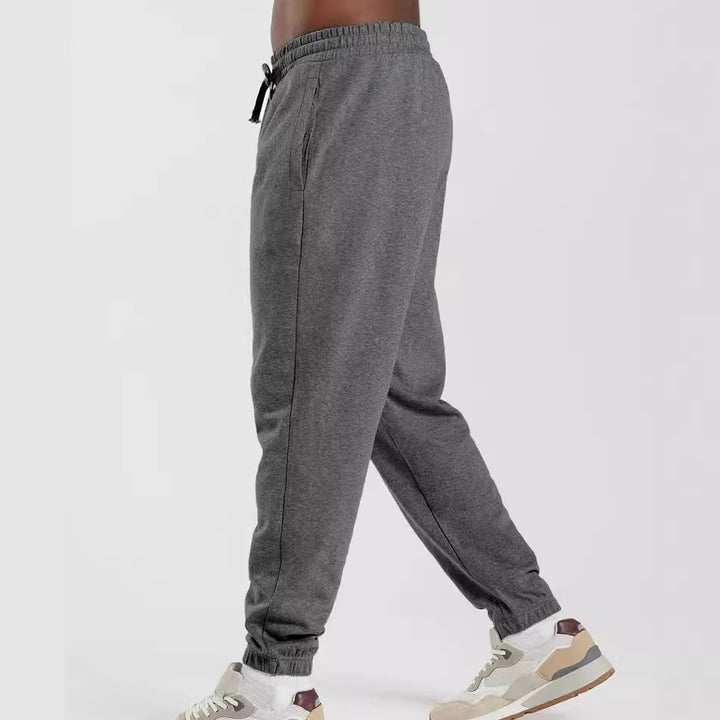 Herrar sportiga joggingbyxor med elastisk midja och sidfickor Mirla-Eva Jonsson