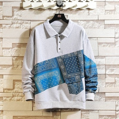 Herrar stilfull polo-tröja med paisley-design och klassisk krage Mirla-Eva Jonsson