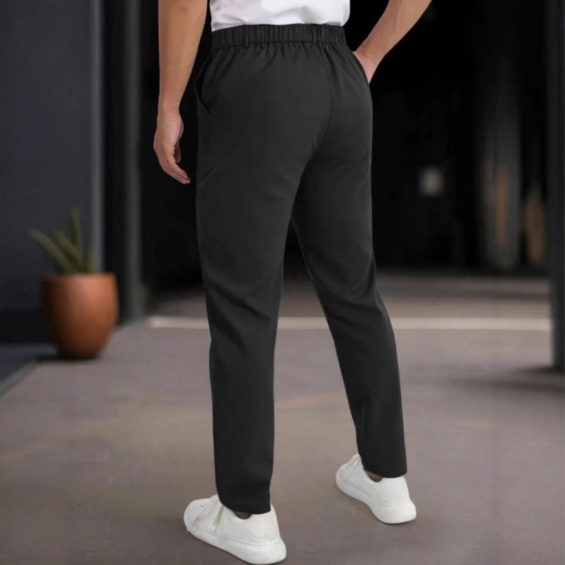 Herrar stiliga Slim-Fit kostymbyxor med plisserad design Mirla-Eva Jonsson