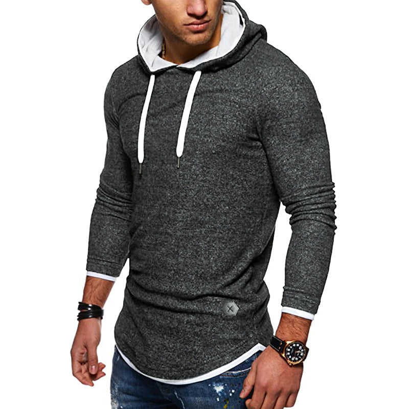 Herrar sweatshirt med innovativ layering-design och kontrasterande huva Mirla-Eva Jonsson