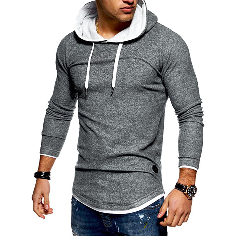 Herrar sweatshirt med innovativ layering-design och kontrasterande huva Mirla-Eva Jonsson