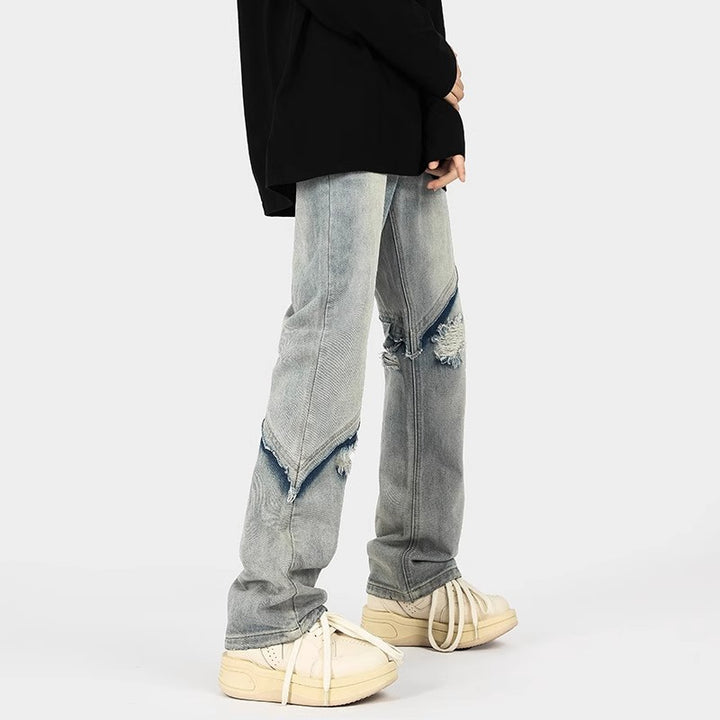Herrar trendiga Ripped Denim-byxor i avslappnad passform med asymmetrisk design Mirla-Eva Jonsson
