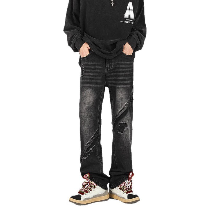 Herrar trendiga Ripped Denim-byxor i avslappnad passform med asymmetrisk design Mirla-Eva Jonsson