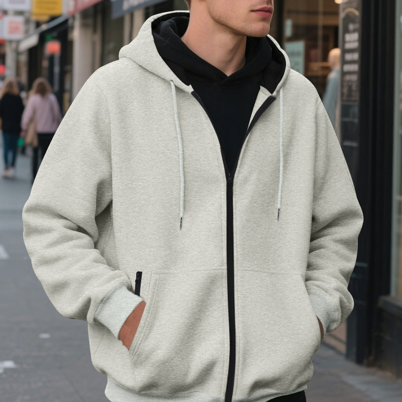 Herrar zip-hoodie med praktiska fickor och ventilerande fleece-inredning Mirla-Eva Jonsson