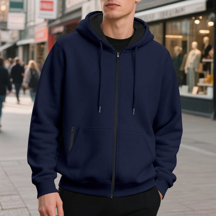 Herrar zip-hoodie med praktiska fickor och ventilerande fleece-inredning Mirla-Eva Jonsson