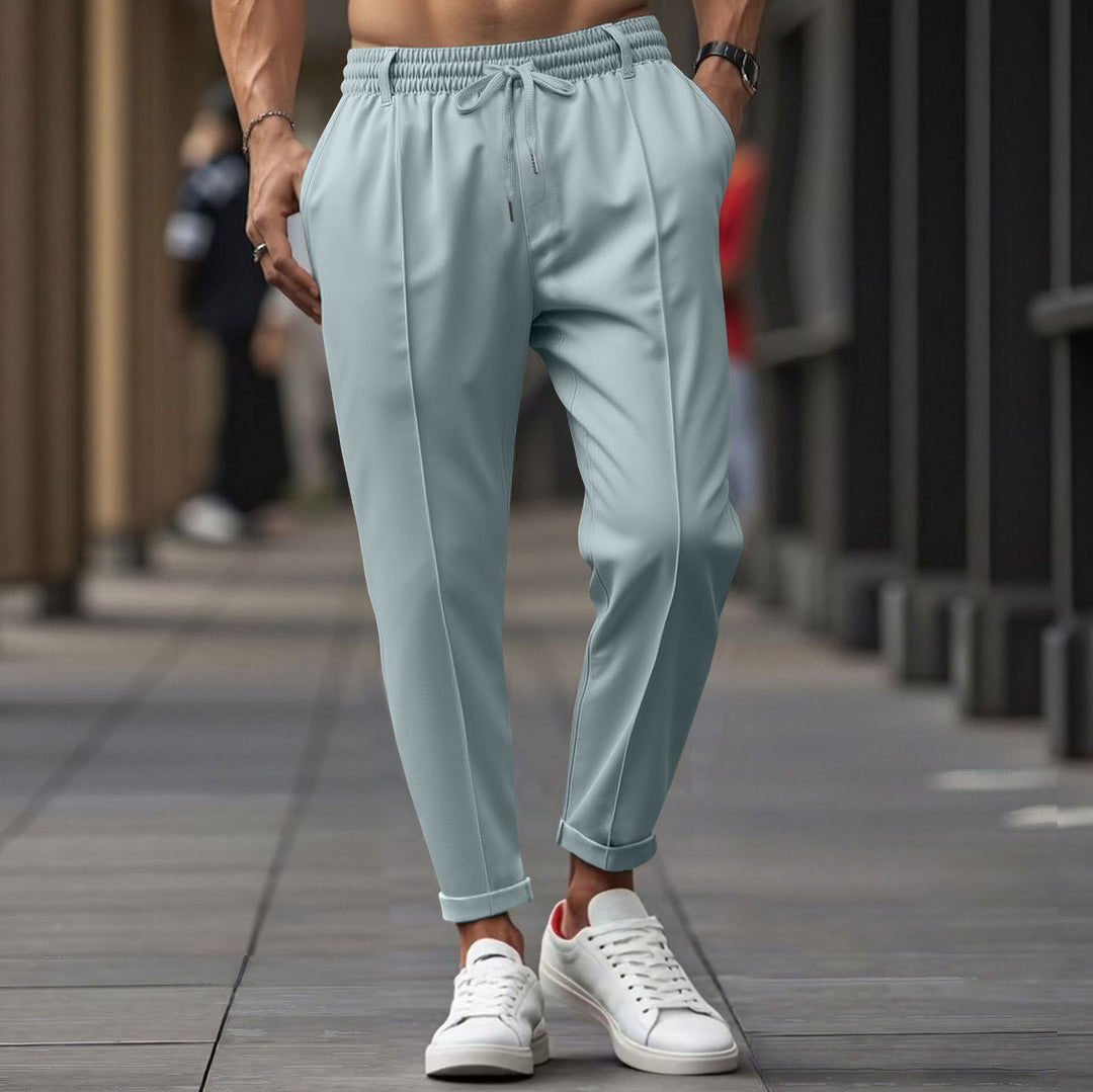 Herrarnas avslappnade joggingbyxor med elastisk midja och praktiska sidofickor Mirla-Eva Jonsson