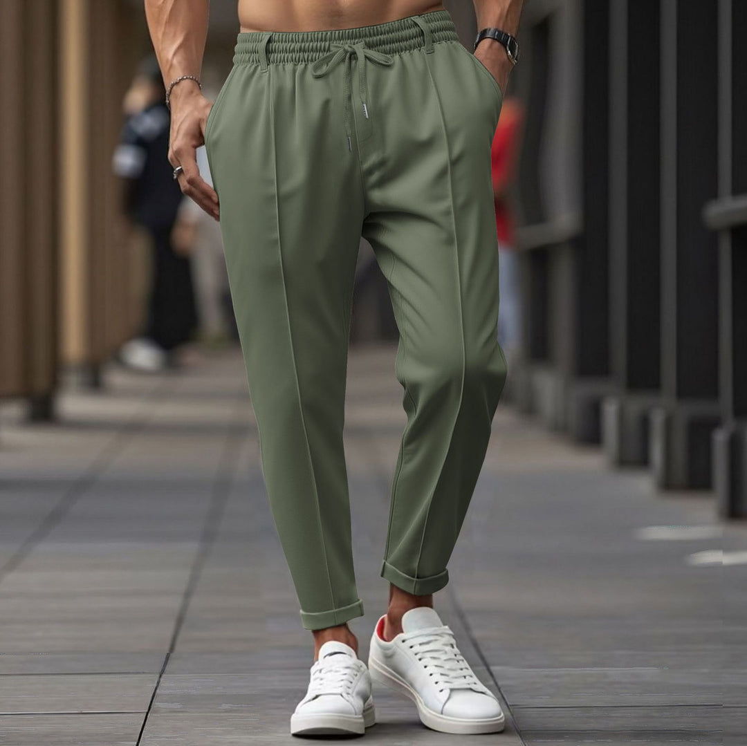 Herrarnas avslappnade joggingbyxor med elastisk midja och praktiska sidofickor Mirla-Eva Jonsson