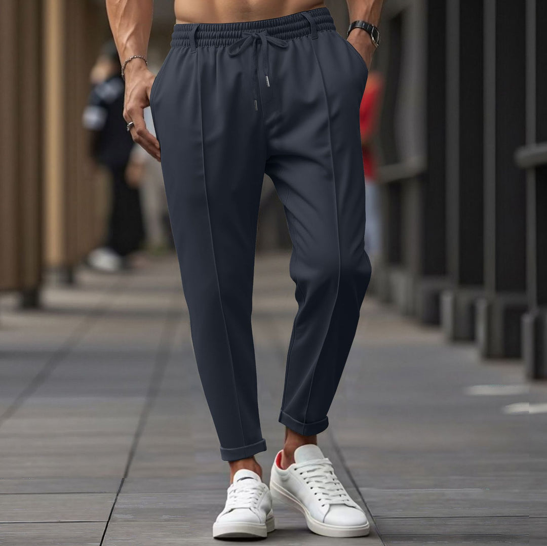 Herrarnas avslappnade joggingbyxor med elastisk midja och praktiska sidofickor Mirla-Eva Jonsson