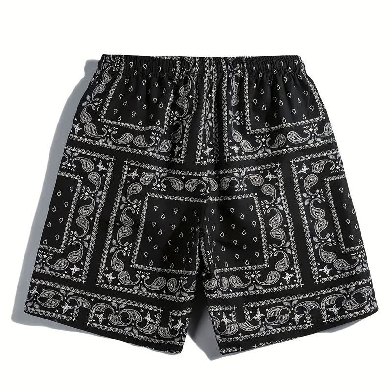 Herrarnas badshorts i andningsbart material med modernt paisleymönster Mirla-Eva Jonsson