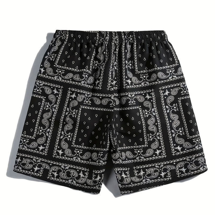 Herrarnas badshorts i andningsbart material med modernt paisleymönster Mirla-Eva Jonsson