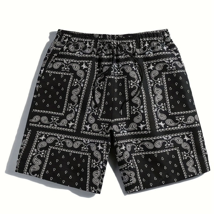 Herrarnas badshorts i andningsbart material med modernt paisleymönster Mirla-Eva Jonsson