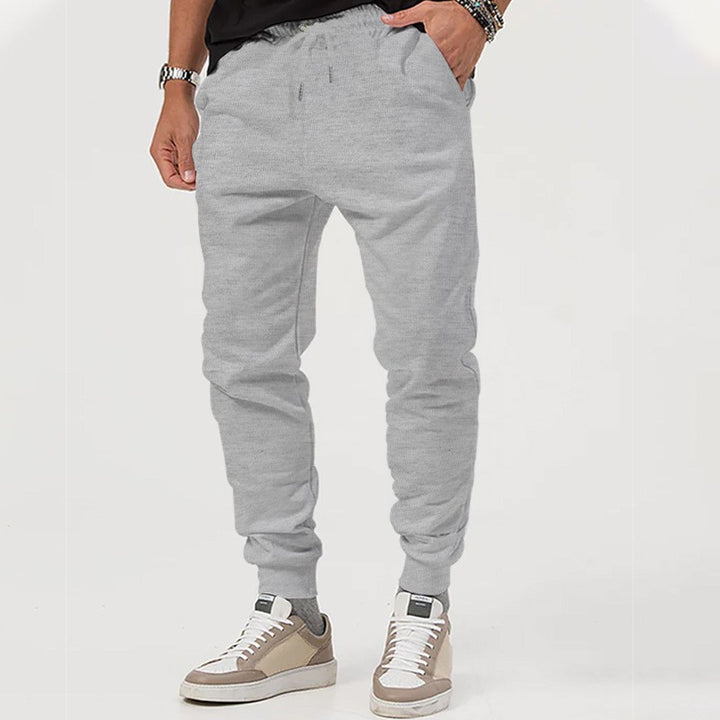 Herrarnas bekväma sweatpants med elastisk midja och sidofickor Eva Jonsson-Eva Jonsson