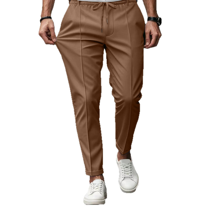 Herrarnas eleganta Chino-byxor med elastisk midja och sidofickor Mirla-Eva Jonsson