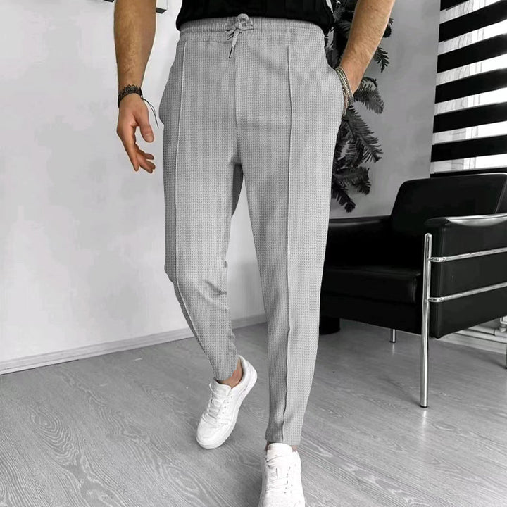 Herrarnas eleganta fritidsbyxor med elastisk midja och sidofickor Eva Jonsson-Eva Jonsson