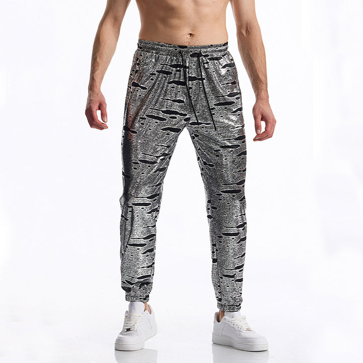 Herrarnas eleganta joggingsbyxor med glänsande metallicmönster Mirla-Eva Jonsson