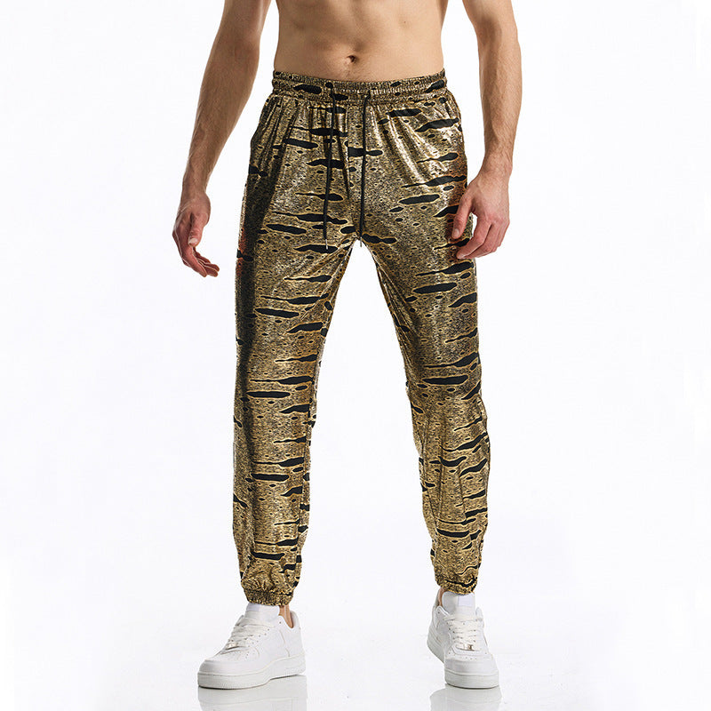 Herrarnas eleganta joggingsbyxor med glänsande metallicmönster Mirla-Eva Jonsson