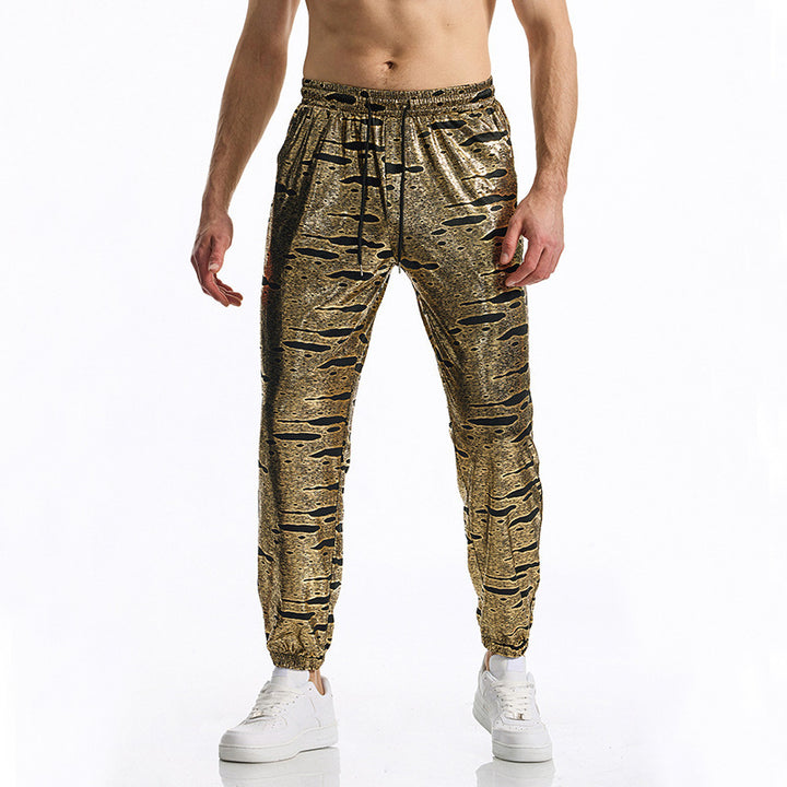Herrarnas eleganta joggingsbyxor med glänsande metallicmönster Mirla-Eva Jonsson