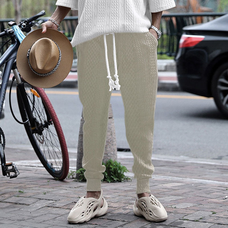 Herrarnas fritids-joggingbyxa med elastisk midja och strukturerad yta Mirla-Eva Jonsson