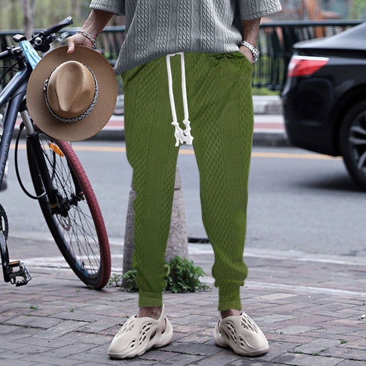 Herrarnas fritids-joggingbyxa med elastisk midja och strukturerad yta Mirla-Eva Jonsson