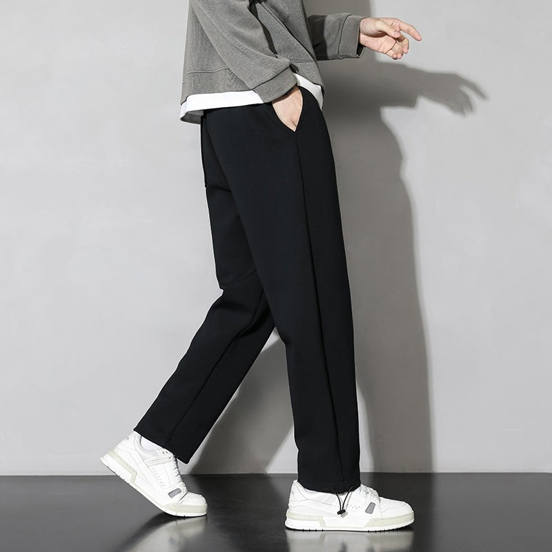 Herrarnas fritids-joggingbyxor med elastisk midja och sidofickor med dragkedja Mirla-Eva Jonsson