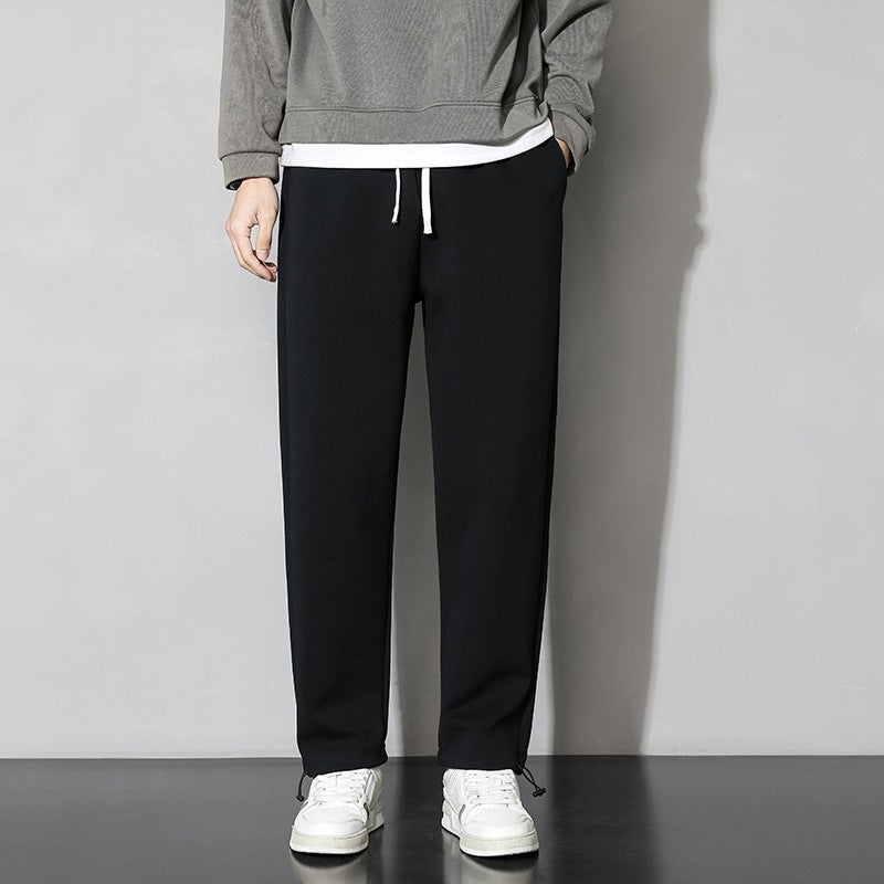 Herrarnas fritids-joggingbyxor med elastisk midja och sidofickor med dragkedja Mirla-Eva Jonsson