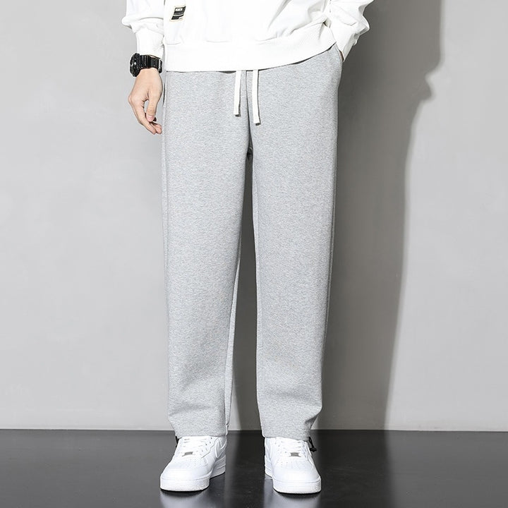 Herrarnas fritids-joggingbyxor med elastisk midja och sidofickor med dragkedja Mirla-Eva Jonsson